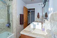 Hall bath with custom stone