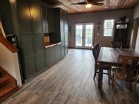 Dining area floor to ceiling cabinets