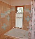 Jetted tub in guest bathroom